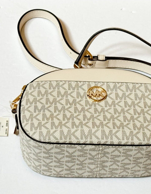 Load image into Gallery viewer, MICHAEL KORS JET SET GLAM SMALL FRONT POCKET OVAL CROSSBODY BAG MK LIGHT CREAM
